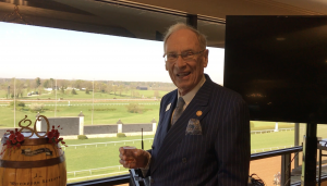 Forcht: a man in a suit smiling at the camera