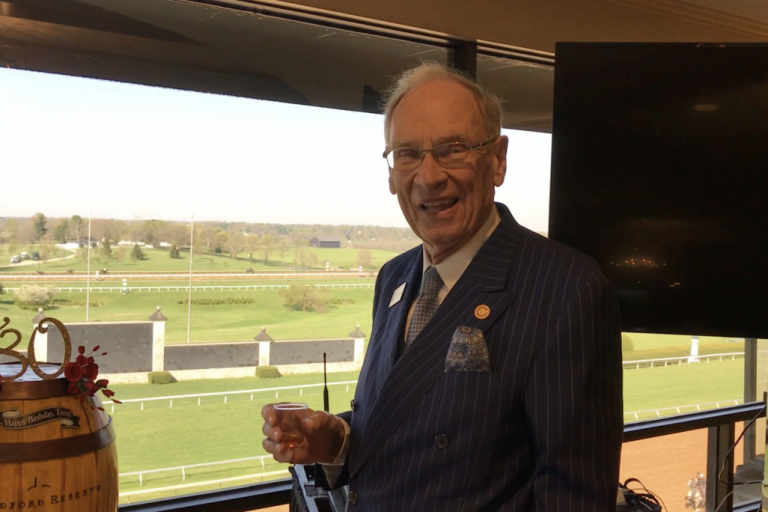 Forcht: a man in a suit smiling at the camera
