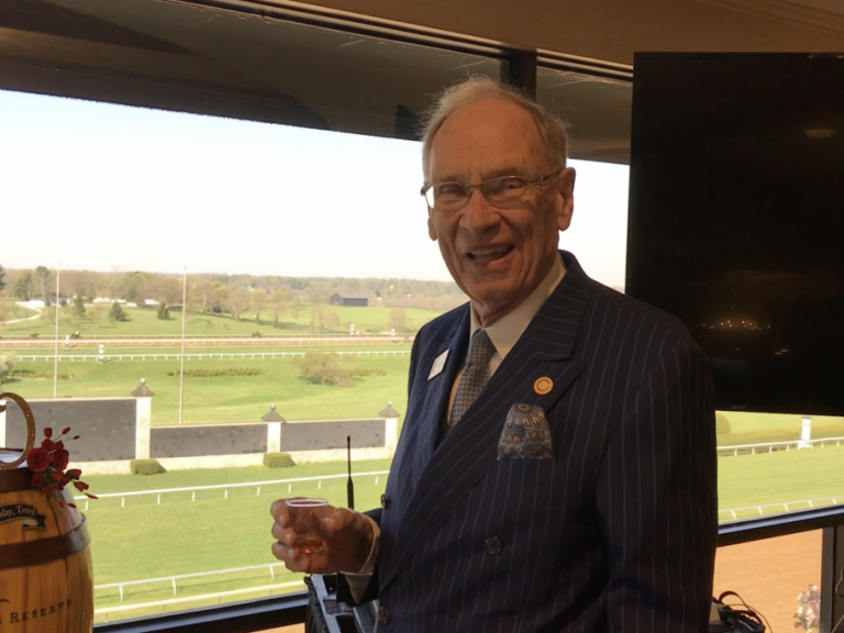 Forcht: a man in a suit smiling at the camera