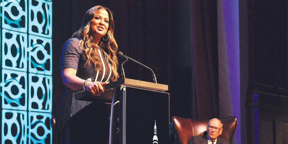 Laila Ali at the Forcht Excellence in Leadership Series Forcht: a woman in a navy dress speaking