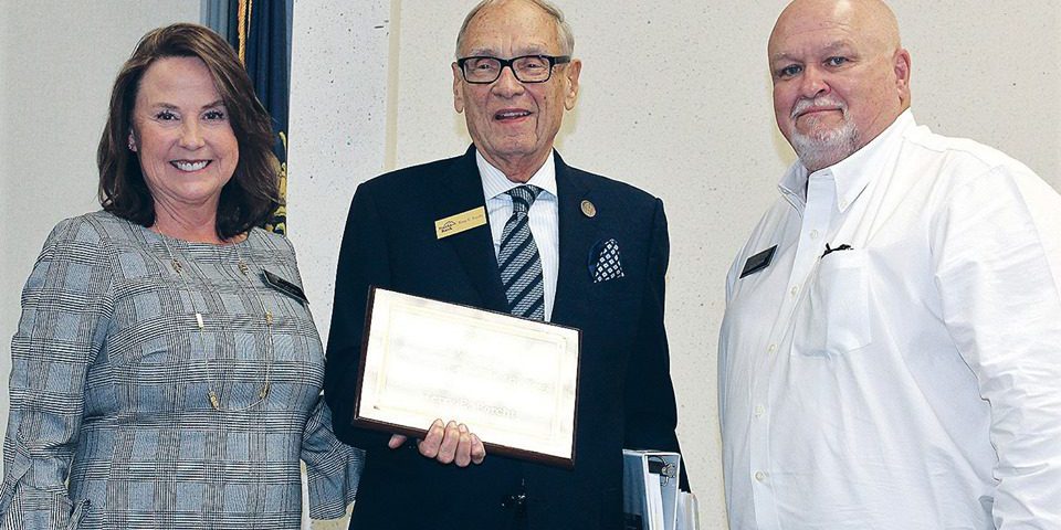 Forcht Group-Terry Forcht Corbin: two men and a woman smiling at the camera